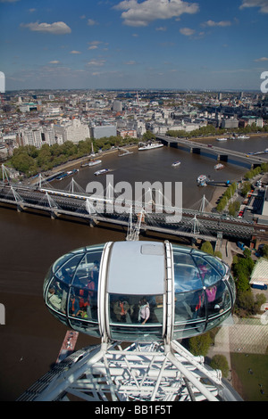 London Eye and view over the Golden Jubilee (Hungerford Bridge), the city and River Thames, London, England Stock Photo