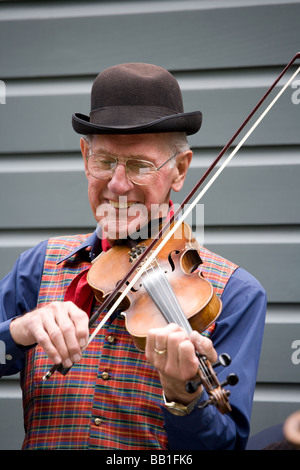 Musician in Arrowtown South Island New Zealand Stock Photo