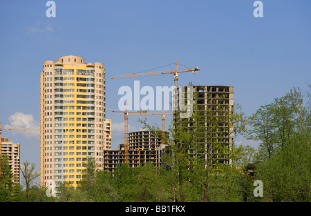 new block of flats in the park Stock Photo