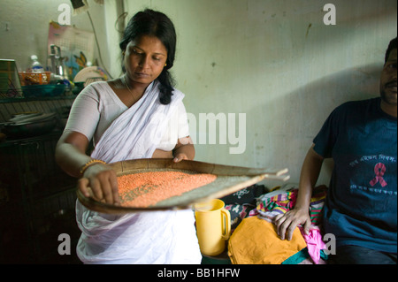 Leader for women's rights making food in brothel, Tangail, Bangladesh. Stock Photo