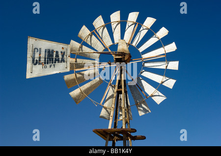 Windmill in the Klein Karoo along the R62 between Oudtshoorn and Ladismith. Western Cape, South Africa. Stock Photo