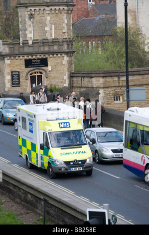 Ambulance speeding through heavy city centre traffic in York Stock Photo