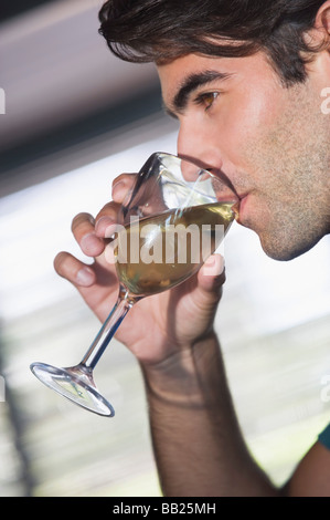 Close-up of a man drinking wine from a glass Stock Photo