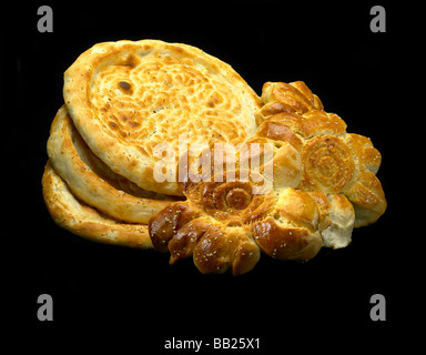 original fresh uzbek bread isolated over black background Stock Photo