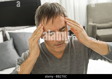Man suffering from headache Stock Photo