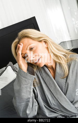 Woman suffering from headache Stock Photo