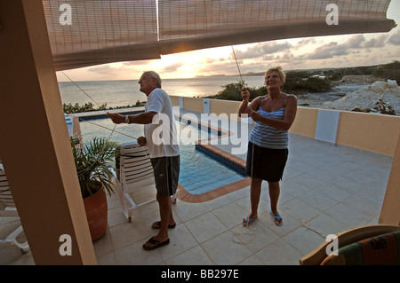 Netherlands Antilles Bonaire Dutch pensioners in their house with swimmingpool and ocean view Stock Photo