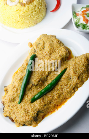 Doi ilish Hilsa or Ilish Mach is a popular fish dish from eastern part of India. Stock Photo