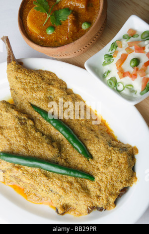 Doi ilish Hilsa or Ilish Mach is a popular fish dish from eastern part of India. Stock Photo