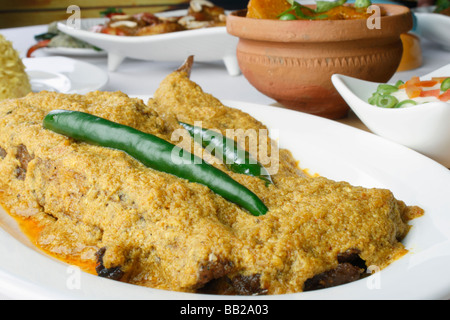 Doi ilish Hilsa or Ilish Mach is a popular fish dish from eastern part of India. Stock Photo