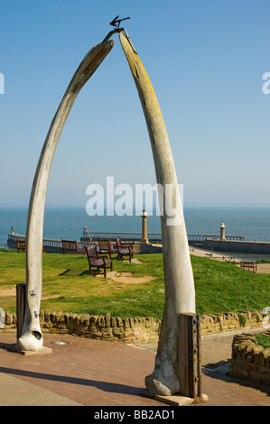 Whalebone arch with Whitby Harbour in the background North Yorkshire England UK United Kingdom GB Great Britain Stock Photo