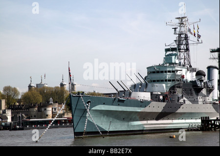 Shot of the HMS Belfast with the Tower of London in the Background Stock Photo