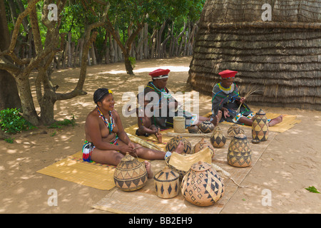 Zulu women making straw baskets, KwaZulu Natal, 'South Africa'