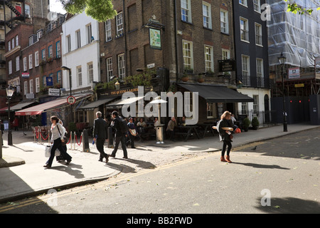 The Queens Larder Pub, Cosmo Place, with outside drinkers and smokers, Bloomsbury, London, UK Stock Photo