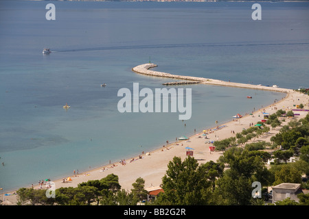Traveling Croatia; The sand jetty projects into the sea in Omis, Croatia. Stock Photo