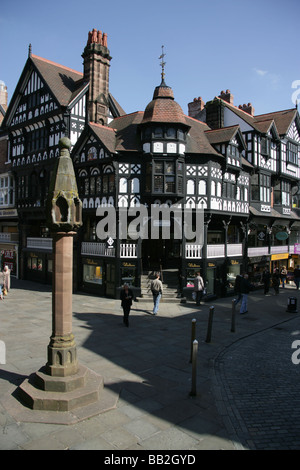 City of Chester, England. 14th century Chester High Cross, with the junction of Eastgate and Bridge Street in the background. Stock Photo