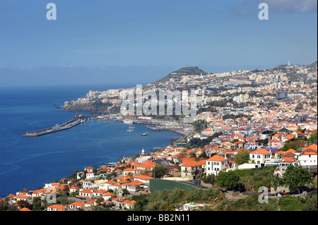 The view of Funchal town and harbour from Sao Goncalo on the island of Madeira. Funchal is the capital of Madeira. Stock Photo