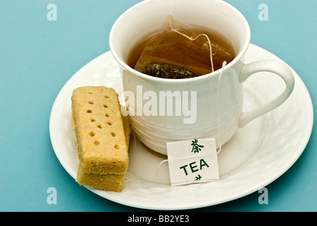 Cup of tea with shortbread biscuit Stock Photo
