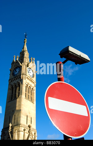 no entry sign seen against a blue sky and the coronation clock, commemorating edward VII in surbiton, surrey, england Stock Photo