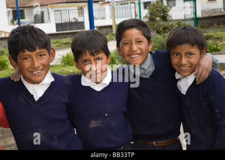 South America, Ecuador, Lasso, school children doing community service project at church garden Stock Photo