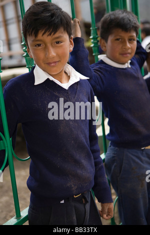 South America, Ecuador, Lasso, school children doing community service project at church garden Stock Photo