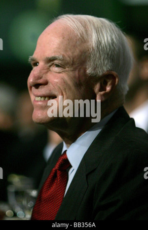 Presidential candidate Senator John McCain R-AZ listens to President George W Stock Photo