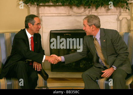 President George W. Bush meets with Alvaro Colom president of Guatemala in the Oval Office of the White House on April 28 2008.