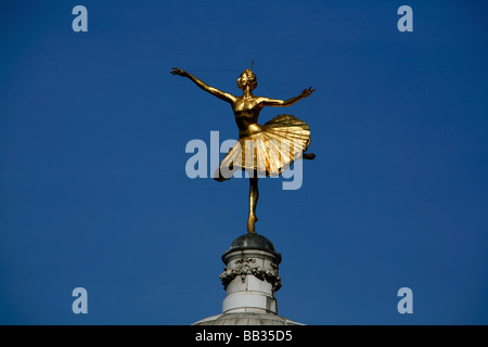 Statue of prima ballerina Anna Pavlova on top of the Victoria Palace Theatre, Victoria, London, UK Stock Photo