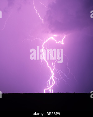 Single bolt of lightning hits ground from a solitary thunderstorm Stock ...