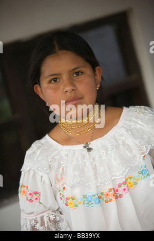 South America, Ecuador, Peguche, village of weavers near Otavalo, teenage girl in traditional Otavaleno clothing Stock Photo
