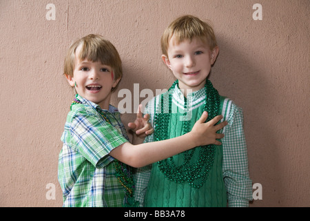 USA; Georgia; Savannah.  Two young boys celebrating St. Patrick's Day. Stock Photo