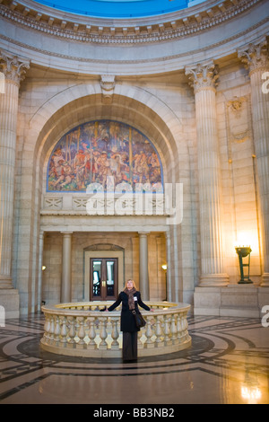 Woman admiring the interior architecture of the Manitoba Legislature Building, Winnipeg, Manitoba, Canada. Stock Photo