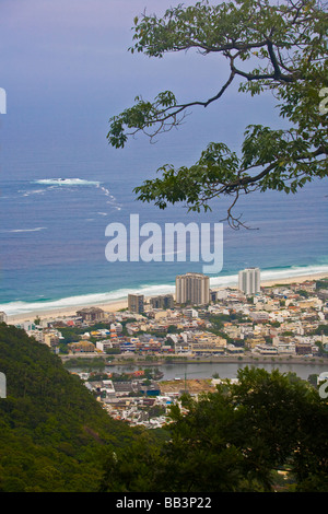 A view on Rio de Janeiro's Barra de Tijuca neighborhood from the Pedra de Gavea mountain in the Atlantic rainforest, Brazil. Stock Photo