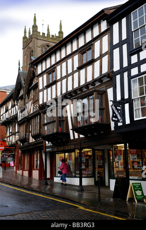 VIEW OF ST LAURENCES CHURCH ABOVE TIMBER FRAMED BUILDINGS FROM BROAD STREET IN LUDLOW SHROPSHIRE UK Stock Photo