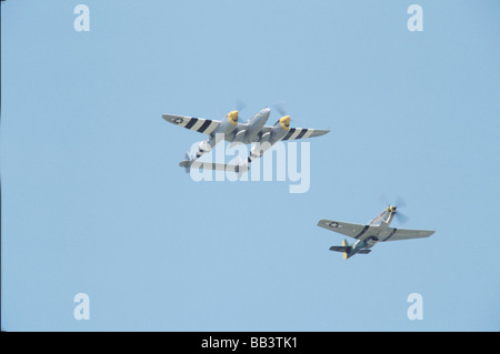 Lockheed P-38 Lightning, Joltin'  Josie and North American P-51D Mustang Gunfighter in the air Stock Photo