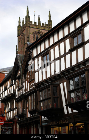 VIEW OF ST LAURENCES CHURCH ABOVE TIMBER FRAMED BUILDINGS FROM BROAD STREET IN LUDLOW SHROPSHIRE UK Stock Photo