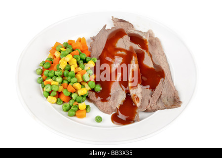 Roast beef with vegetables on a plate served as a main meal Stock Photo