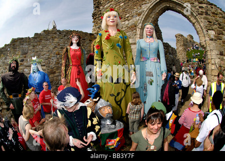 Giants at Jack in the Green Spring Festival at Hastings Castle in Hastings Sussex Stock Photo
