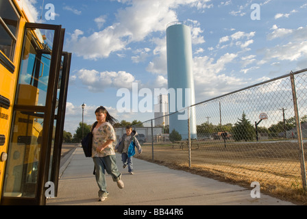 Catching the school bus in Sugar City, Colorado. Stock Photo