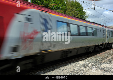 British Rail Class 390 'Pendolino', electric multiple unit, at speed. West Coast main line, Lambrigg, Cumbria, England, U.K. Stock Photo