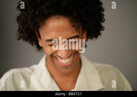 African American man smiles and laughs. Stock Photo