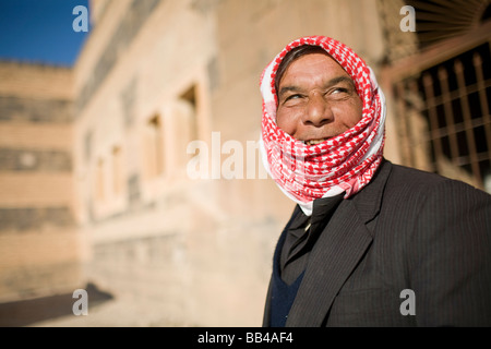 Portrait of a Syrian man smiling in Qala'at ibn maan. Stock Photo
