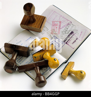 Passport with visas stamps and rubber stamps Stock Photo
