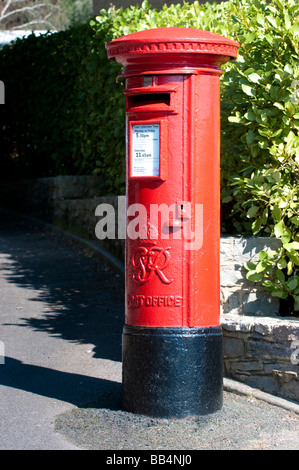 Round tall british Red mail box Stock Photo