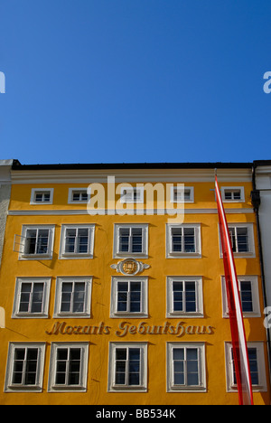 Yellow Facade of Mozart s Birthplace Mozarts Geburtshaus on Getreidegasse Street in Historic Centre of Salzburg Austria Stock Photo