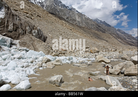 Pilgrims bathing in the source of Ganges river. Gaumukh Glacier (3892m). Gangotri National Park. Uttarakhand. India Stock Photo