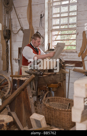 The wheelwright's workshop at Colonial Williamsburg is housed on the grounds of the Governor's Palace. Stock Photo