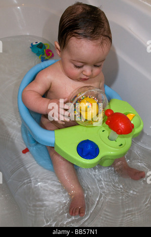 6 month old baby in the bath Stock Photo