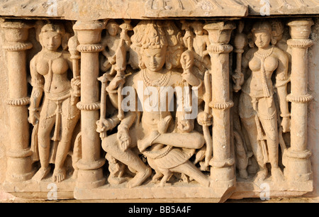 Stone carving on Magar Mandi Mata Mandir Hindu temple. This depicts a god with a bird. Stock Photo