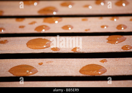 water drops on wood bench Stock Photo